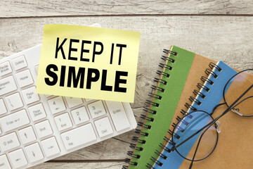 Keep it simple. Note with text. view from above. business concept