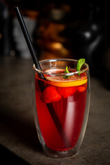 cocktail with red berries and fruits