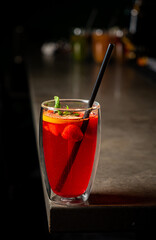 cocktail with red berries and fruits