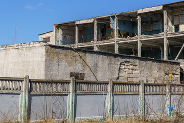 Destroyed industrial factory building. Background with selective focus