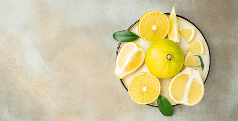 Fresh ripe bergamot orange fruits on a light background, Long banner format. top view - obrazy, fototapety, plakaty