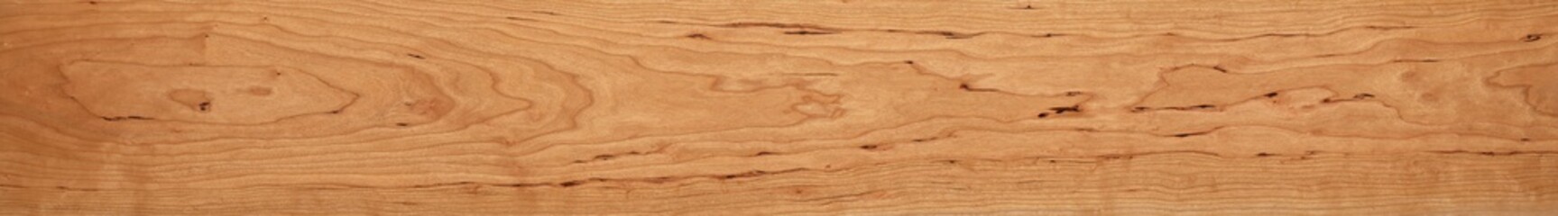 Long cherry wood planks texture background. Broad wood textured background.