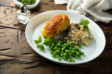 Homemade chicken rissole with mushroom and pea
