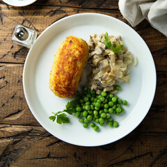 Homemade chicken rissole with mushroom and pea