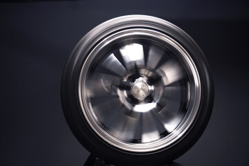 new chrome rims car wheels for a drift car custom tuning long exposure photo motion blur effect
