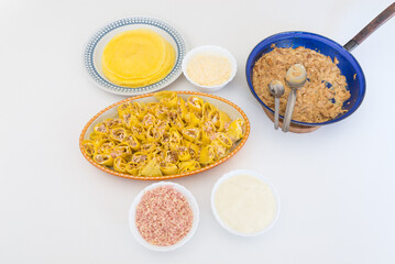 Preparation of crepes with porcini mushrooms, ham, cheese and bechamel
