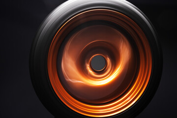 orange metal welded rims car wheels for a drift car custom tuning long exposure photo motion blur...