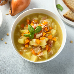 Homemade pea soup with smoked pork