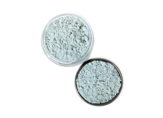 Blue spirulina powder in bowl isolated on white background. SUPERFOOD