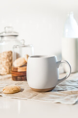 cookies and morning drink, coffee, milk or tea in light natural envoronment, kinfolk style breakfast