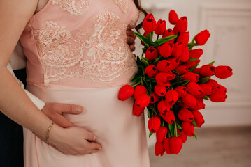 Pregnancy background in pink tones with flowers