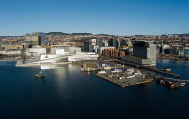Oslo city from aerial drone - the downtown bay area in mid day sunlight - Norway