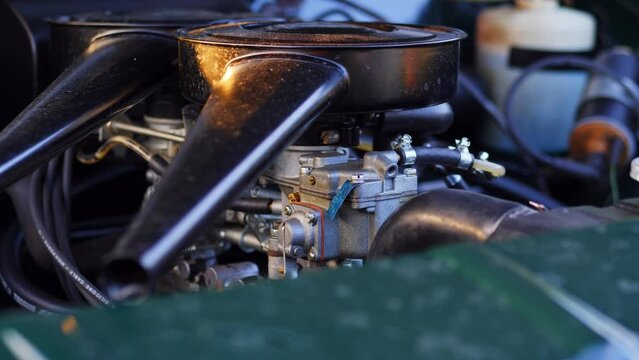 Opel Oympia classic car engine bay parallax shot on a slider during sunset, 50 fps slow motion
