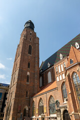 View on the tower of the Saint Elizabeth church in Wroclaw, historic old town. Poland. Vertical orientation