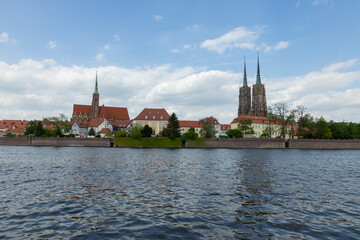 View of the houses on Tumski Island across the river Odra in Wroclaw. Poland