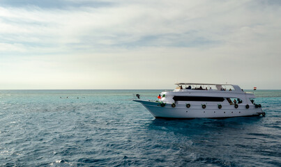 tourists on white boats in the Red Sea Egypt