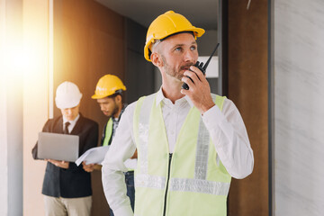 Architect concept, Architects working with blueprints in the office, Vintage Effect