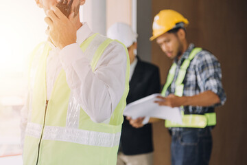 Architect concept, Architects working with blueprints in the office, Vintage Effect