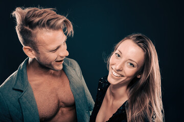 The couple couldn't stop laughing as they share a moment of pure joy and happiness, her face lit up with genuine smile that reflected the depth of their connection while he look surprised to her