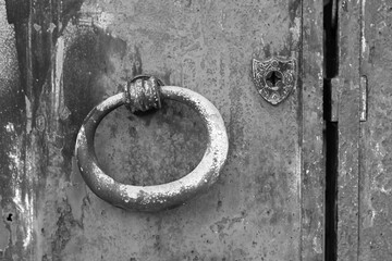 old door knocker in black and white