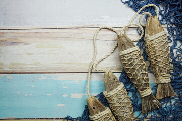 Nautical and summer background top view on wooden background
