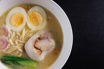 Ramen Japanese noodle isolated in black background