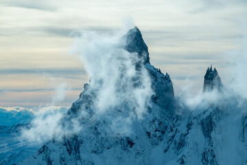 The Matterhorn seen from Italy covered in snow and clouds