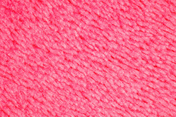 Pink fleecy fibrous surface, background wallpaper, uniform texture pattern