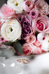 wedding rings and flowers
