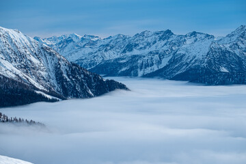 Panorama on Mont Blanc. Mountain wrapped in snow and white clouds.