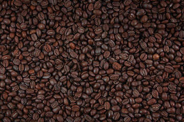 Coffee beans background. View from above. Roasted coffee.