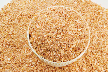 sawdust and shavings in a bowl. material for agriculture. mulch 