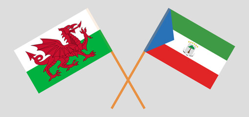 Crossed flags of Wales and Equatorial Guinea. Official colors. Correct proportion