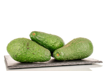 Three juicy avocados, macro, isolated on a white background.
