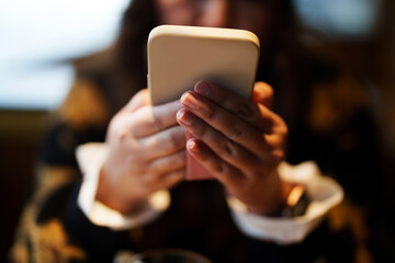 Close up of person looking at mobile phone, Online social addict..