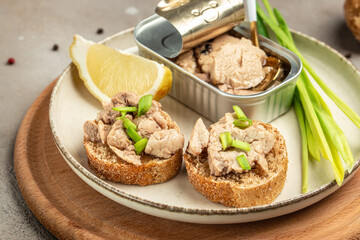 tasty snacks with cod liver on rye bread. Healthy food concept. Food recipe background. Close up