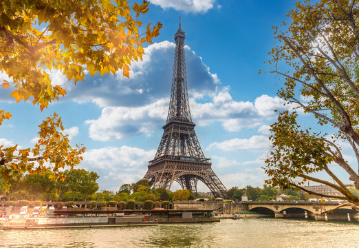 The Eiffel Tower on the banks of the Seine in autumn in Paris, France