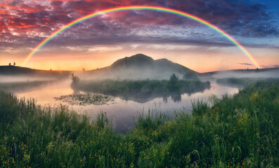 Naklejka premium Landscape with a Rainbow on the River in Spring. colorful morning. nature of Ukraine