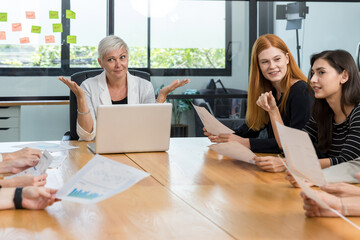 Diverse colleagues gather in brainstorm discuss statistics together. Group of people colleagues gather doing Brainstorming business plan together. Team Brainstorm Working Concept.