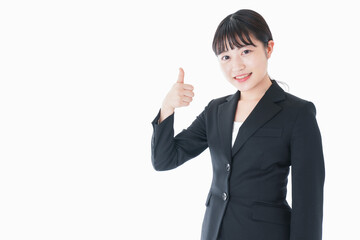 OKサインをするスーツを着たビジネスウーマン