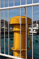 Yellow pipe on the ferry boat.