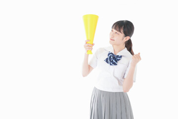 スポーツの応援をする若い女性