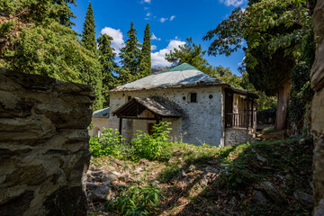 Fototapeta na wymiar Yard outside view, Saint George church, Mikros Pinos village, Thasos island, Greece.