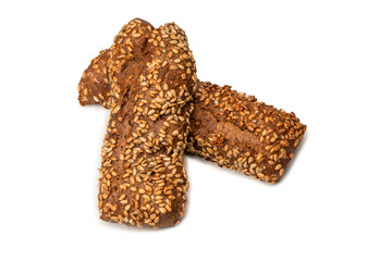 Loaf of bread with sunflower seeds isolated on a white background.