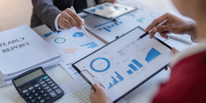 Bookkeeper team accountant or financial expert, economist accounting money with statistics graphs pointing on the accounts for investment results and income Company expenditure