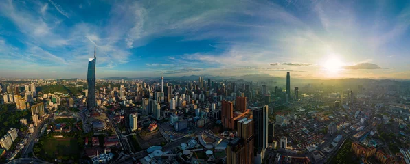 Fotobehang Aerial view The world's second tallest building PNB118 or Merdeka 118 during sunrise © MuhammadSyafiq