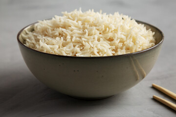 Homemade Cooked Basmati Rice in a Bowl, side view.