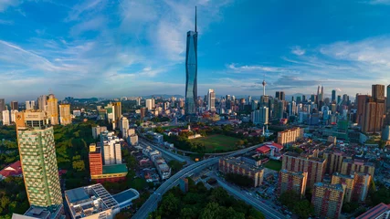 Outdoor kussens Aerial view The world's second tallest building PNB118 or Merdeka 118 during sunrise © MuhammadSyafiq