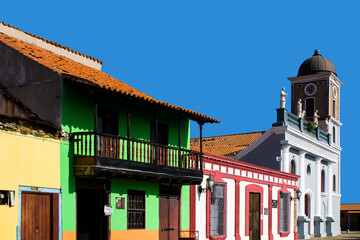 Venezuelan Caribbean architecture, colonial houses next to the cathedral in the historic center of Puerto Cabello