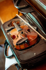 wooden violin in case